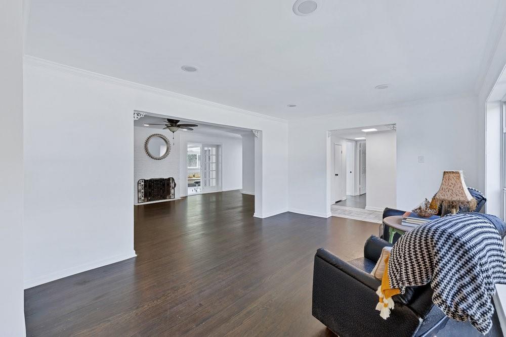 312 West Rio Grande Street Garland, TX 75041 - Photo 5 of 35 a living room with furniture and a window