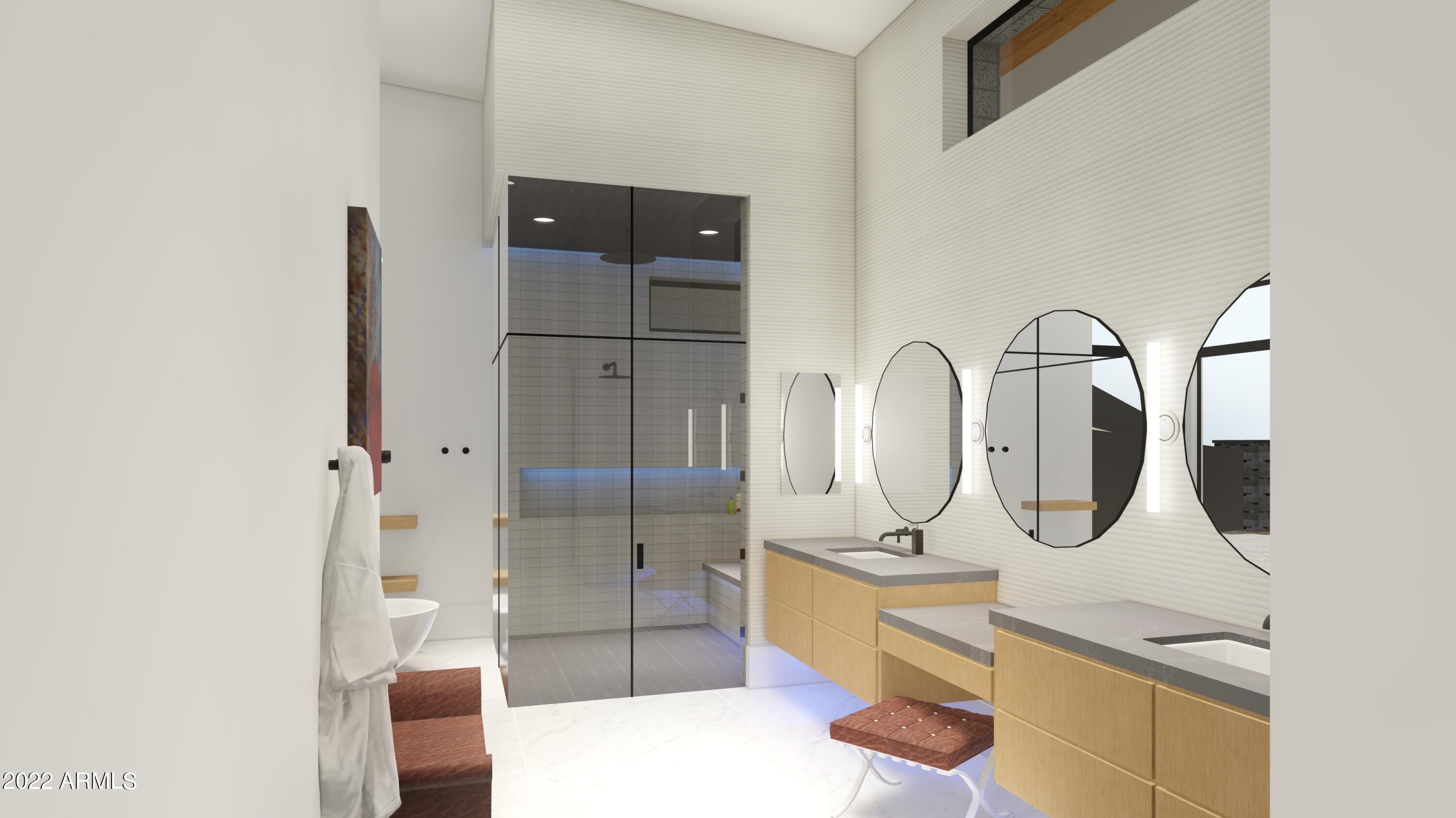 13096 East Cibola Road, Unit 30 Scottsdale, AZ 85259 - Photo 5 of 12 a bathroom with a double vanity sink a toilet and shower