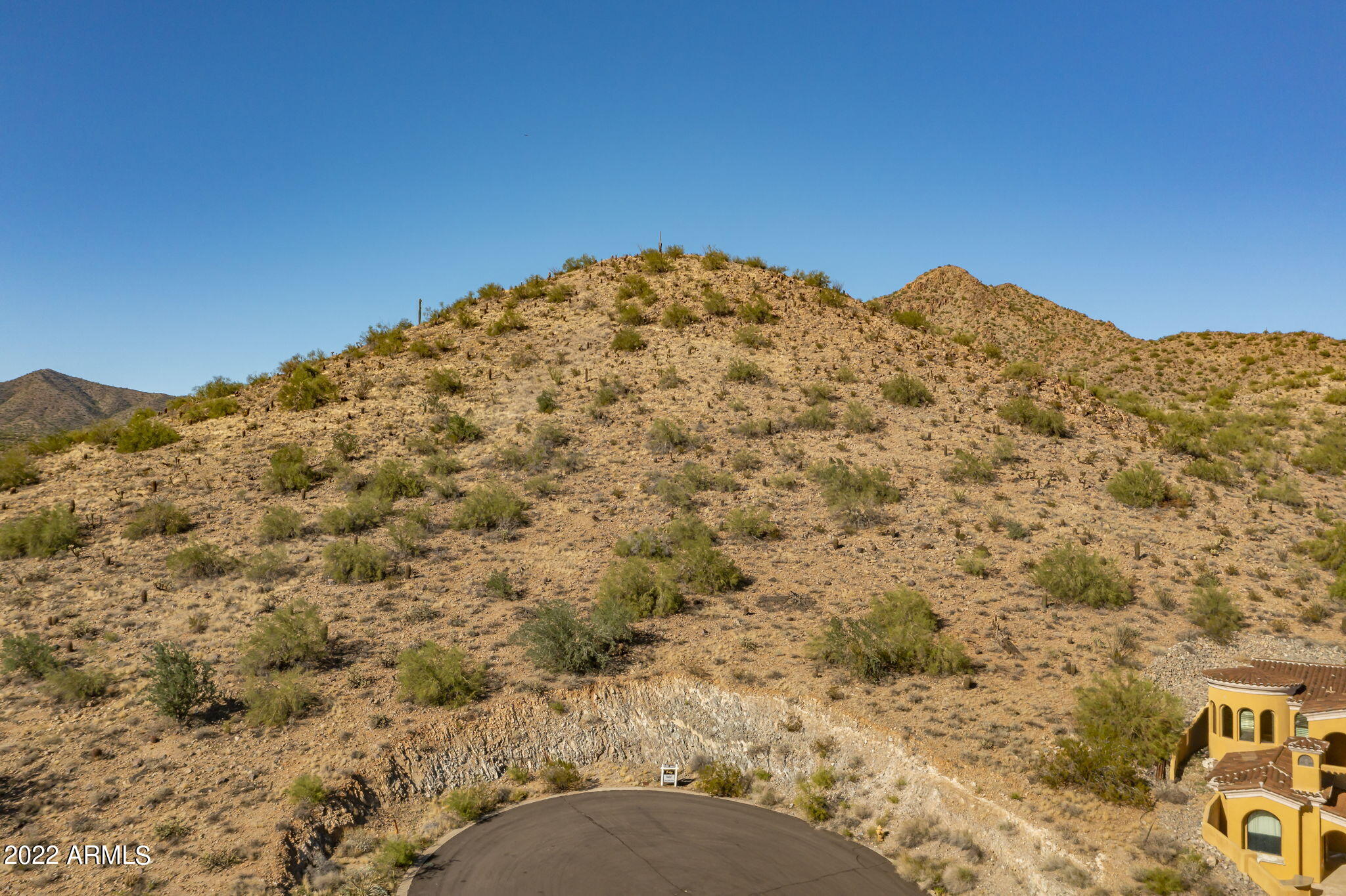 13096 East Cibola Road, Unit 30 Scottsdale, AZ 85259 - Photo 10 of 12 a view of a large mountain with mountains in the background