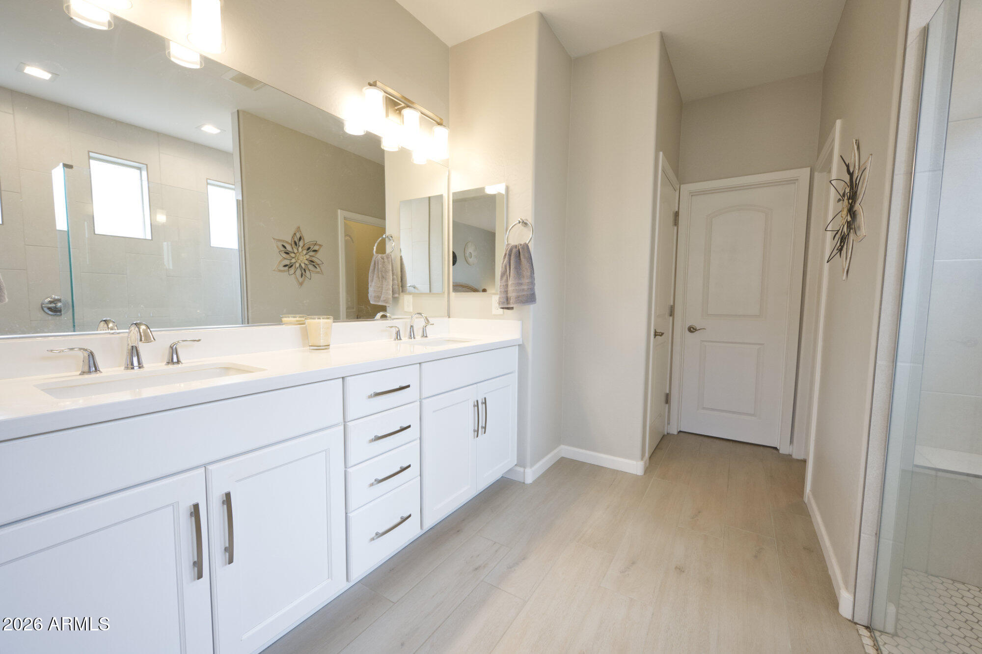 576 Whistle Stop Road Clarkdale, AZ 86324 - Photo 18 of 50 a spacious bathroom with a double vanity sink mirror and double