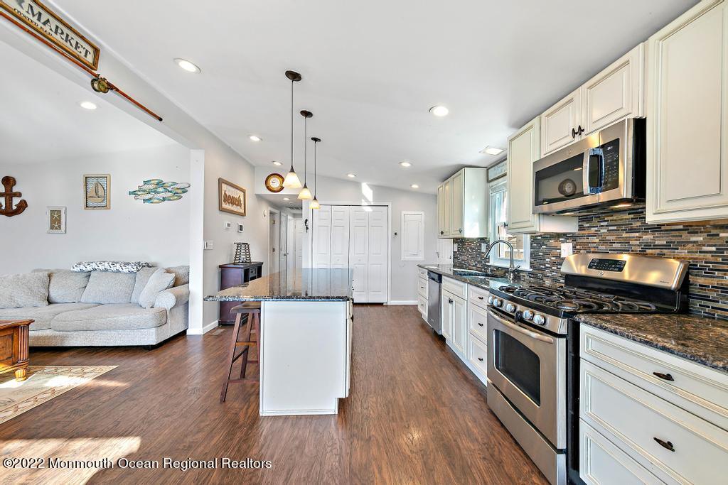 36 Cabana Drive Brick, NJ 08723 - Photo 15 of 42 a large white kitchen with stainless steel appliances