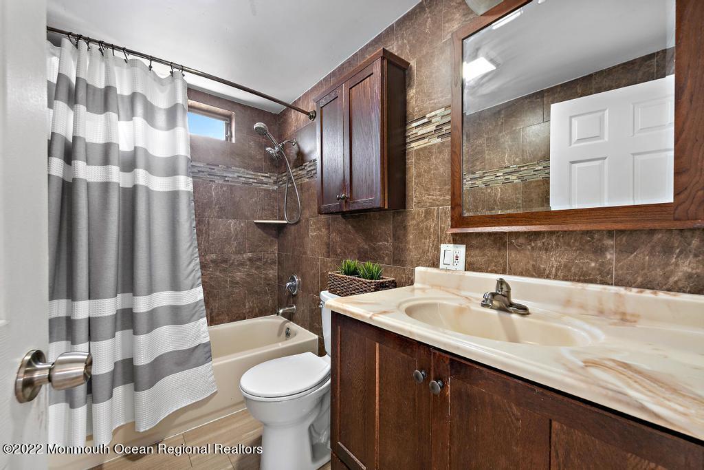 36 Cabana Drive Brick, NJ 08723 - Photo 29 of 42 a bathroom with a sink toilet and shower
