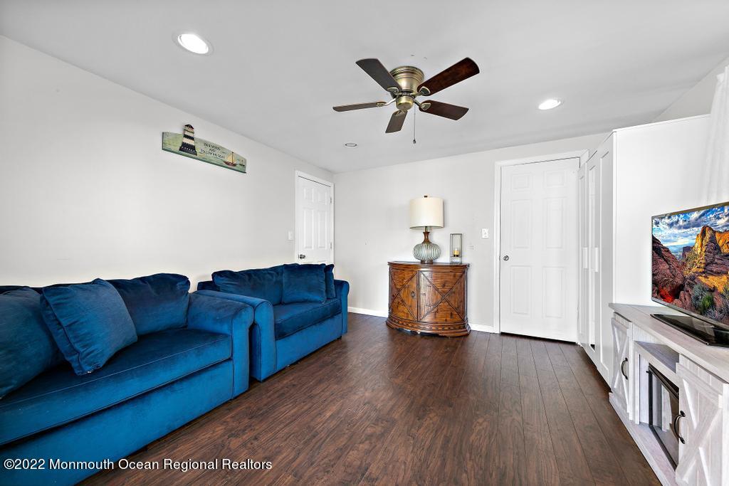 36 Cabana Drive Brick, NJ 08723 - Photo 32 of 42 a living room with furniture and a flat screen tv