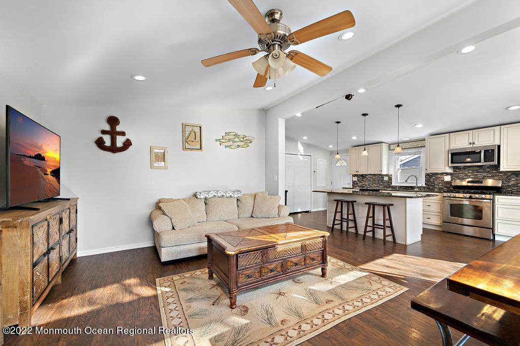 36 Cabana Drive Brick, NJ 08723 - Photo 8 of 42 a living room with furniture and a flat screen tv