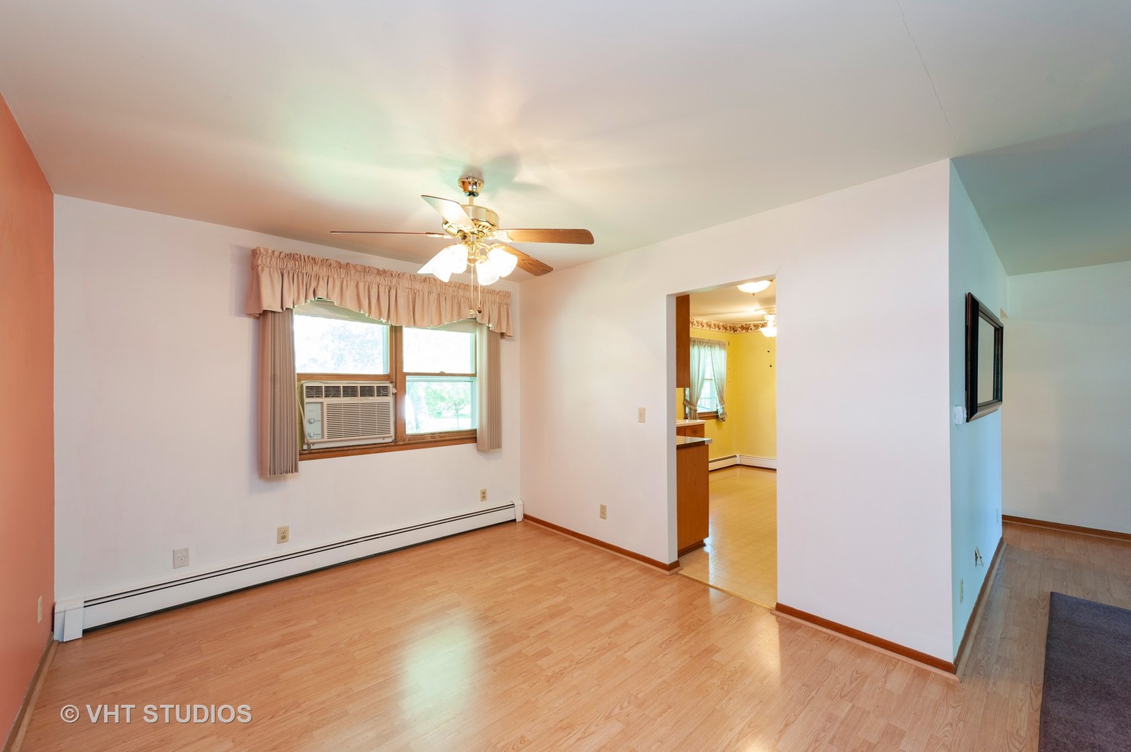 9620 Jean Drive Hebron, IL 60034 - Photo 4 of 11 an empty room with chandelier fan and windows