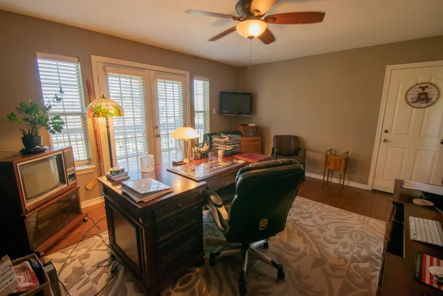 a living room with furniture and a window