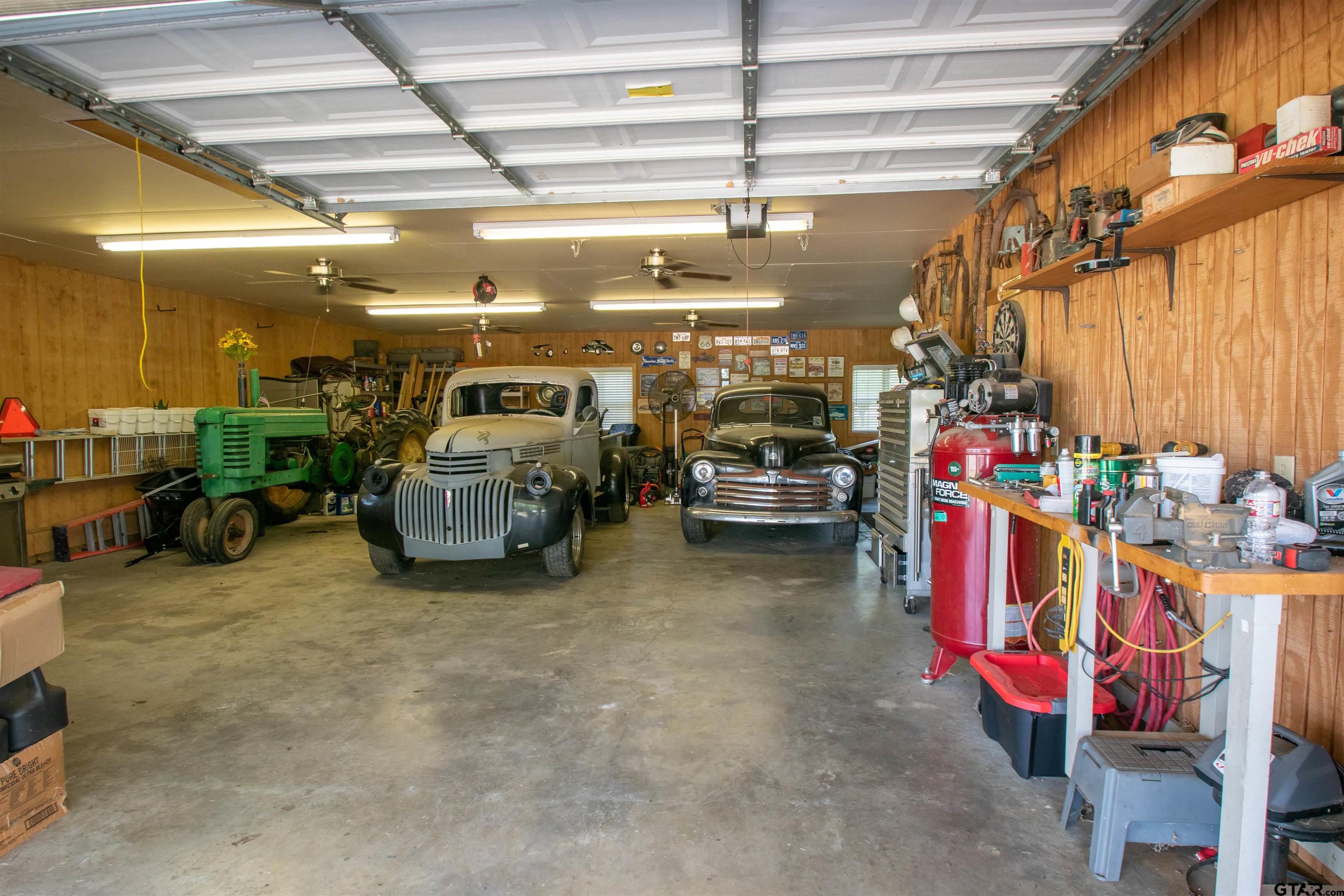 23120 Saddle Ridge Court Lindale, TX 75771 - Photo 32 of 37 a view of parking garage with cars