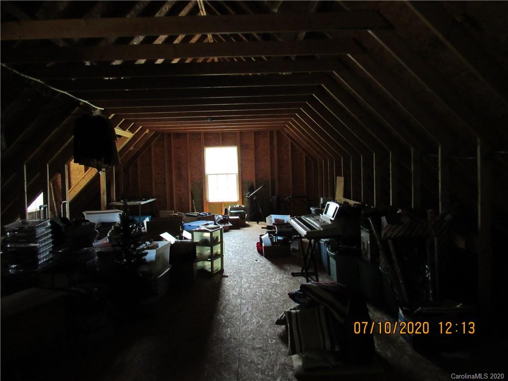 6716 Love Point Road Denver, NC 28037 - Photo 14 of 19 a group of people sitting in a room