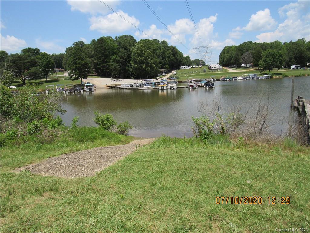6716 Love Point Road Denver, NC 28037 - Photo 3 of 19 a view of a lake view with houses in back