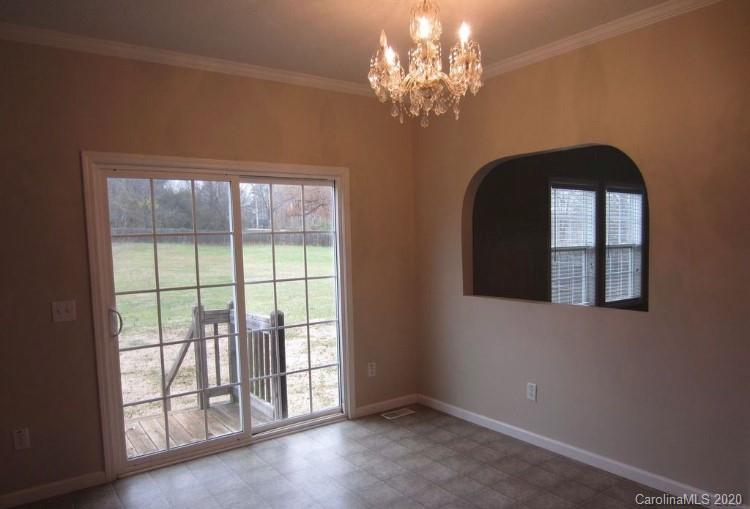 6716 Love Point Road Denver, NC 28037 - Photo 8 of 19 a view of a livingroom with a chandelier