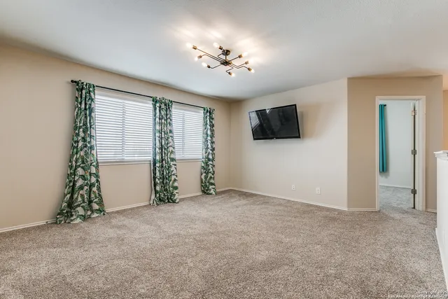a view of a livingroom with a flat screen tv