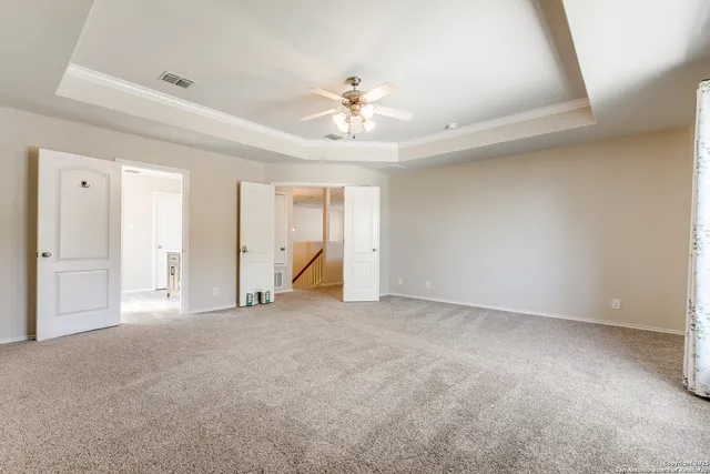 a bathroom with a sink a mirror and a shower