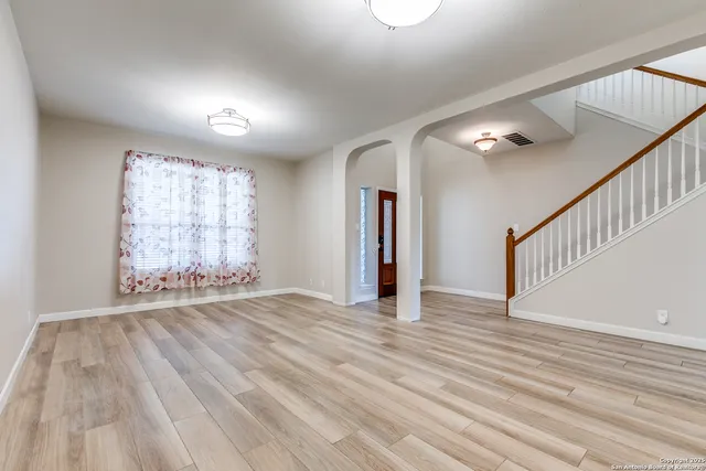 a view of entryway with wooden floor