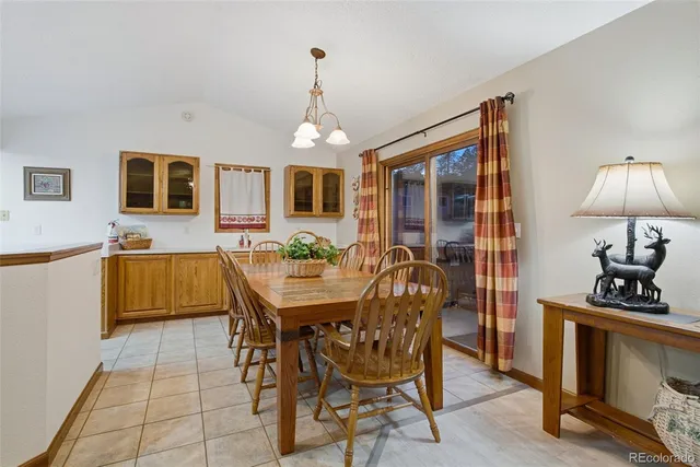 a view of a livingroom with furniture and a flat screen tv
