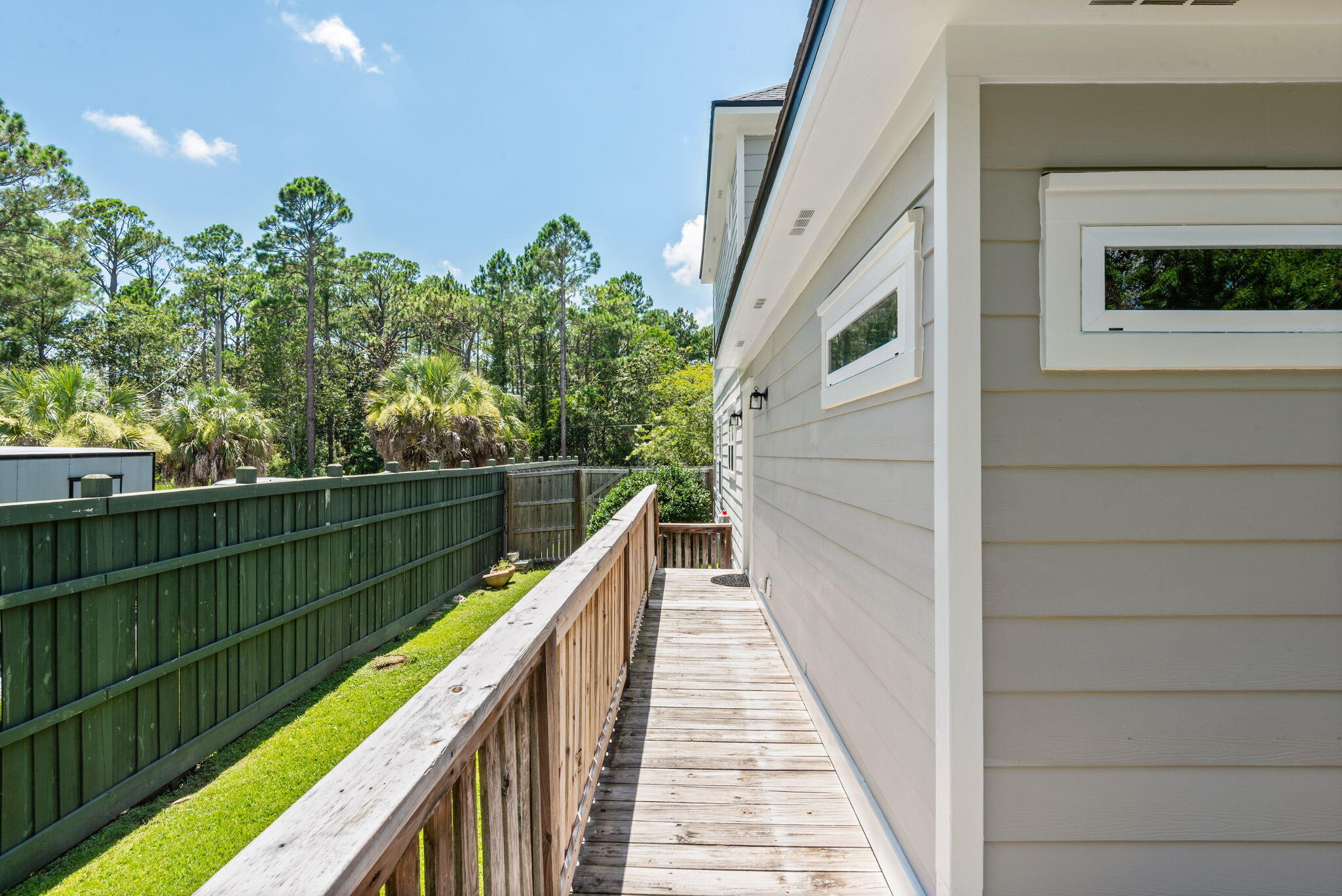 187 7th Street Santa Rosa Beach, FL 32459 - Photo 34 of 47 Deck along side of house