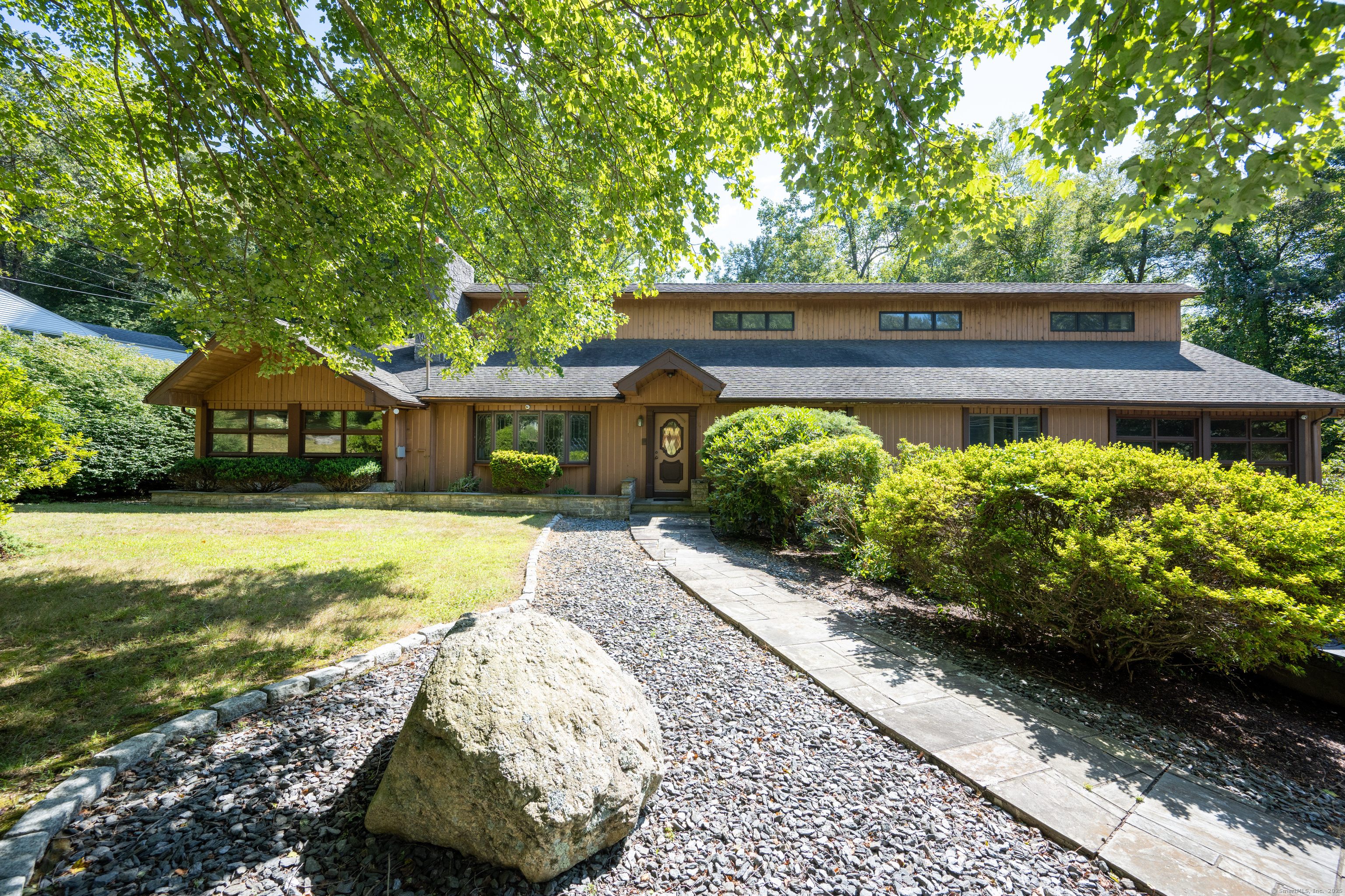 41 Blue Ridge Drive Trumbull, CT 06611 - Photo 1 of 1 a view of house with garden and swimming pool