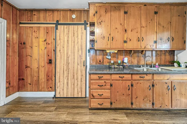 a view of a workspace with furniture