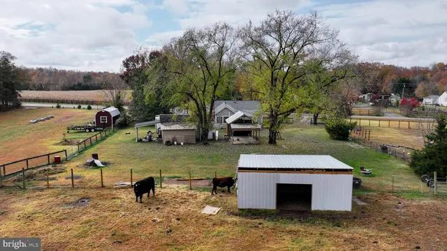 an aerial view of a house with outdoor space