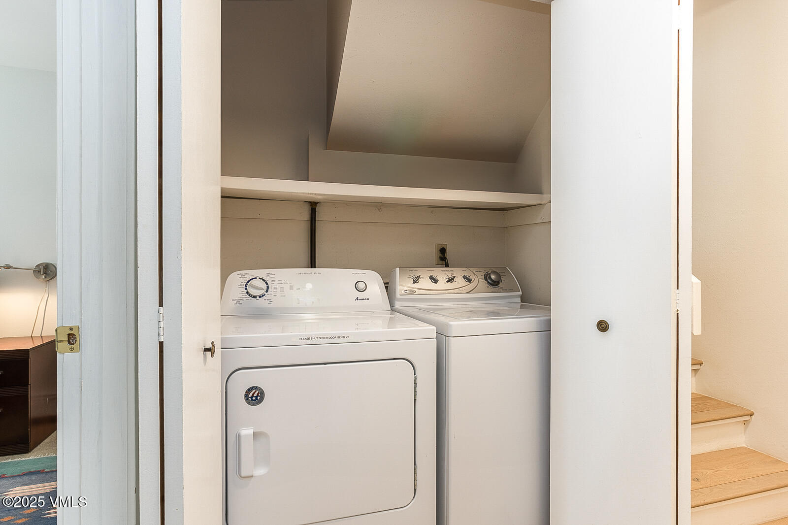 1490 Buffehr Creek Road, Unit A44 Vail, CO 81657 - Photo 24 of 39 a utility room with dryer and washer