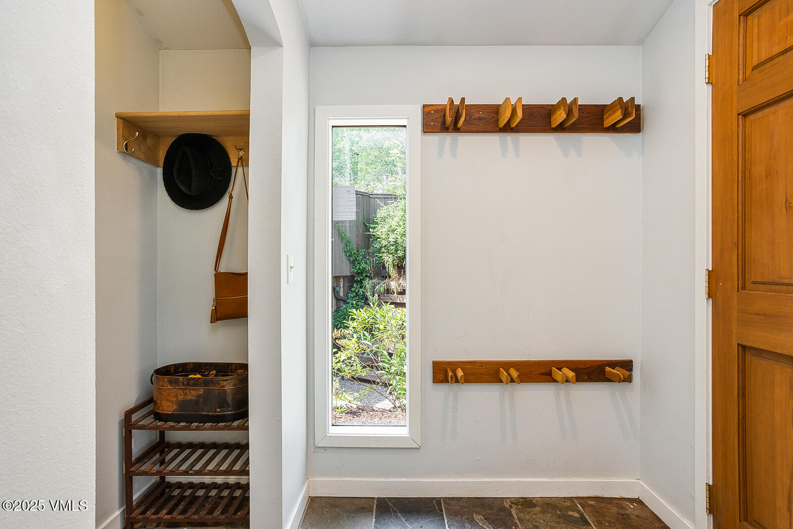1490 Buffehr Creek Road, Unit A44 Vail, CO 81657 - Photo 25 of 39 a view of walk in closet with clothes and shoes