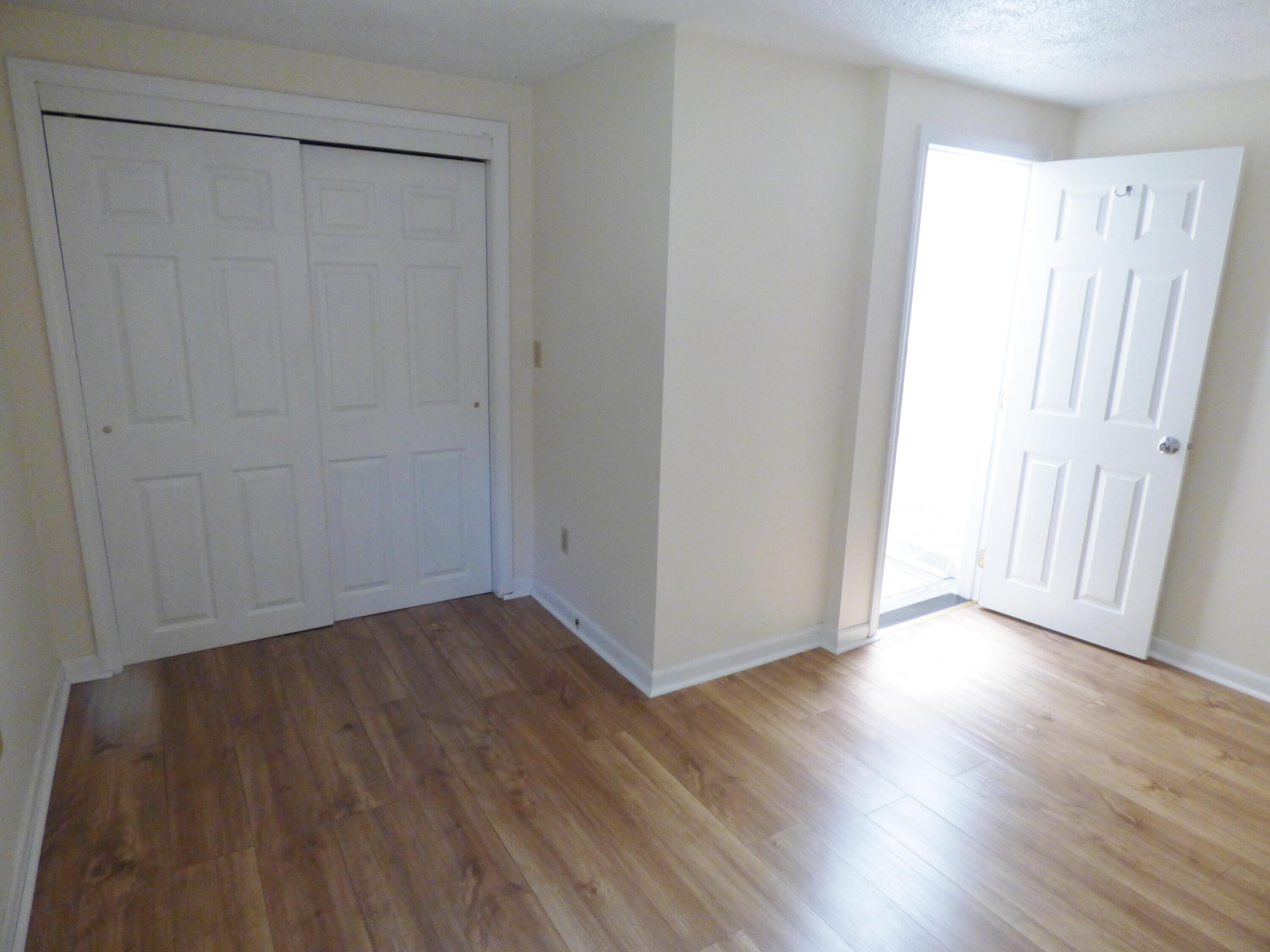 18 Limerick Court Centerville, MA 02632 - Photo 14 of 24 a view of a room with wooden floor and white walls