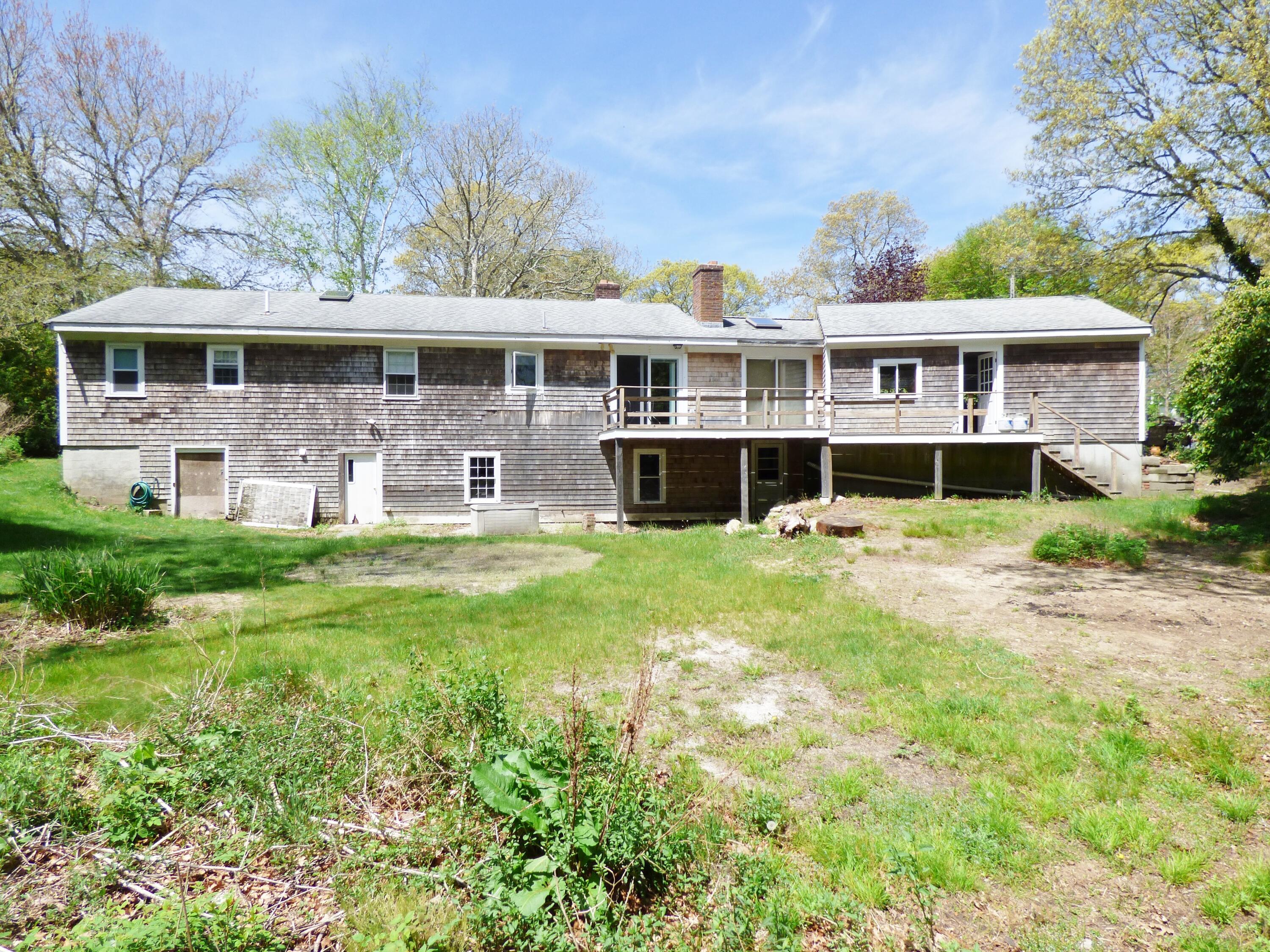 18 Limerick Court Centerville, MA 02632 - Photo 16 of 24 a front view of a house with garden