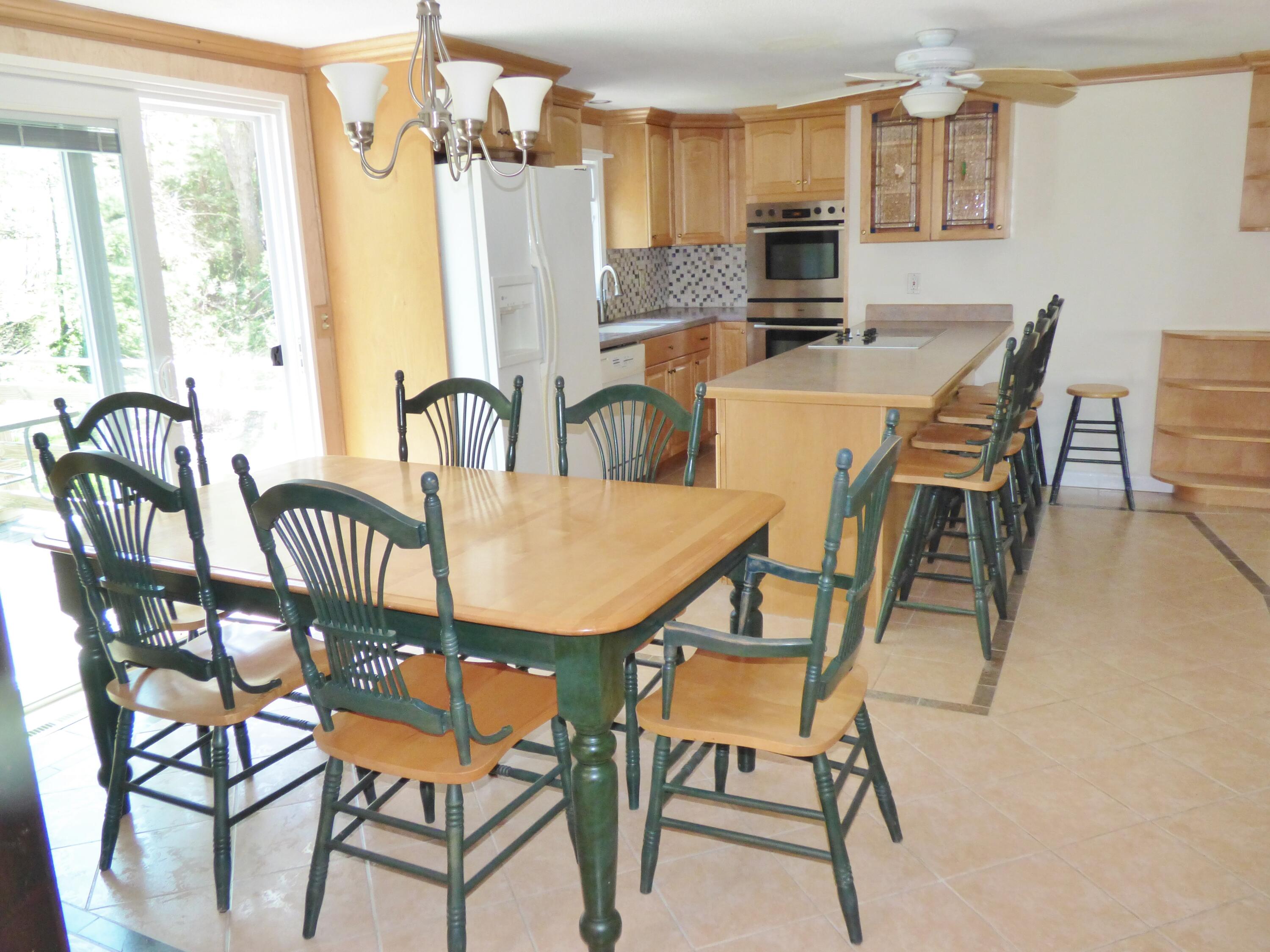 18 Limerick Court Centerville, MA 02632 - Photo 3 of 24 a dining room with furniture and window
