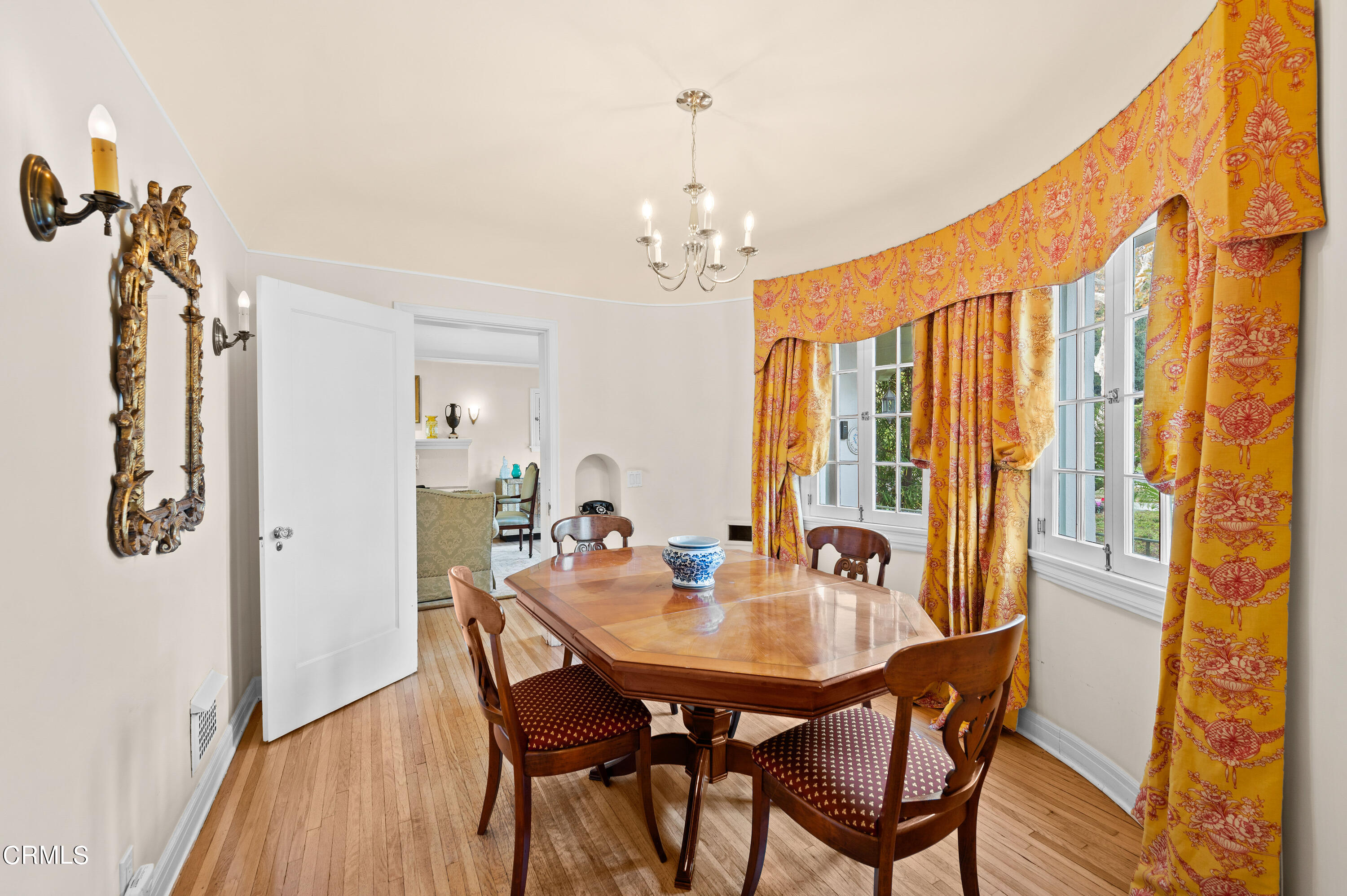 818 Old Mill Road Pasadena, CA 91108 - Photo 16 of 71 a view of a dining room with furniture window and wooden floor