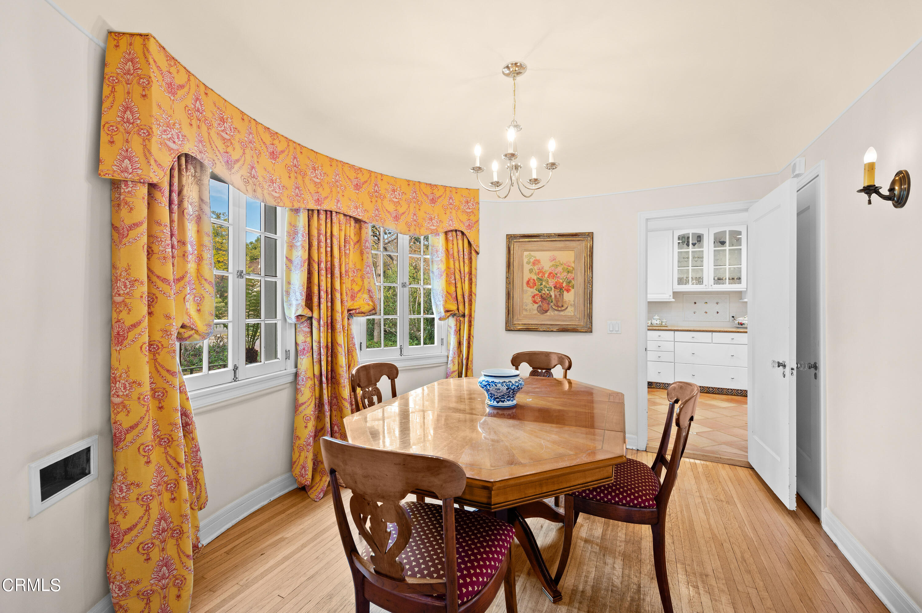 818 Old Mill Road Pasadena, CA 91108 - Photo 17 of 71 a view of a dining room with furniture window and wooden floor