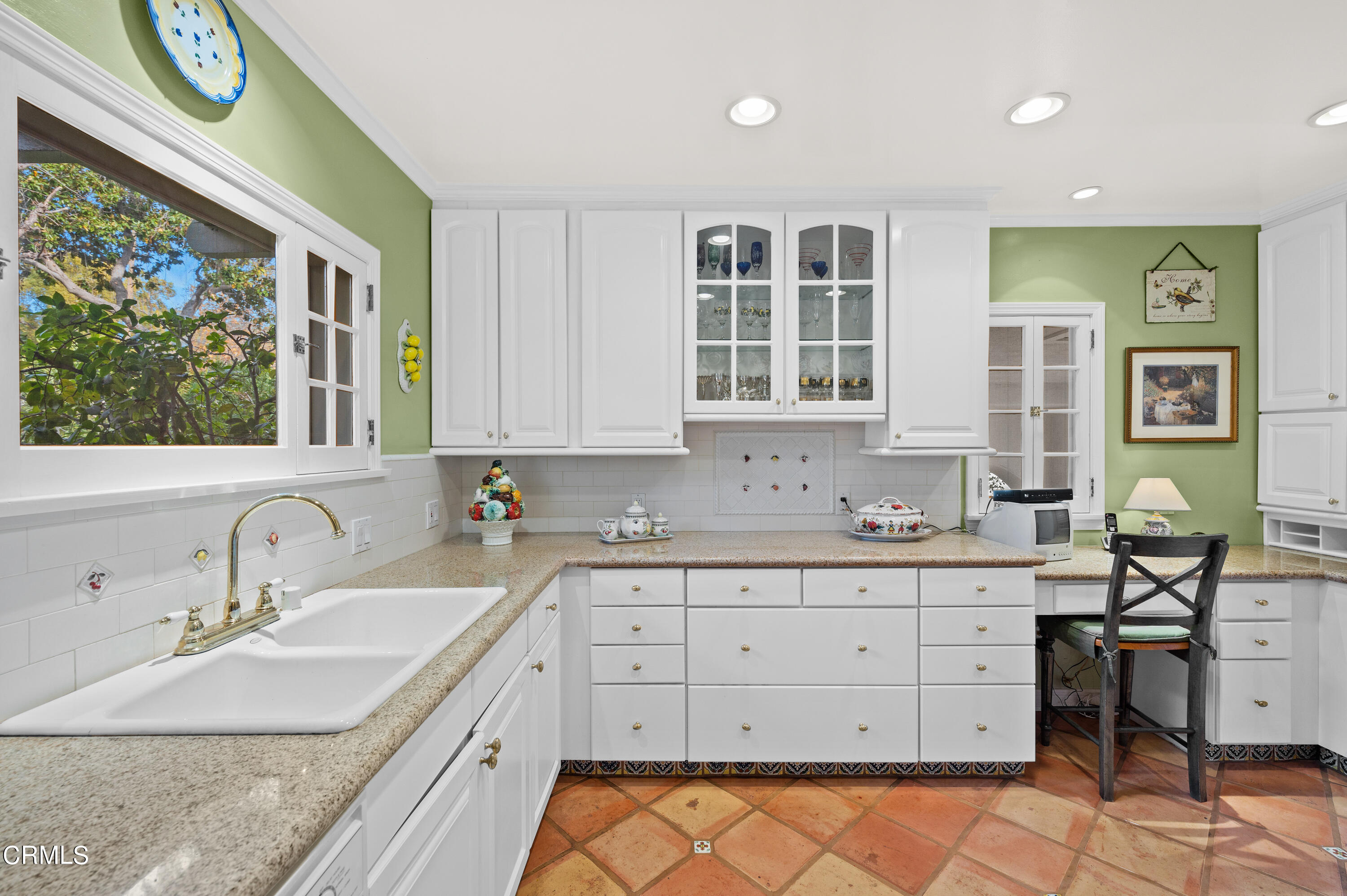 818 Old Mill Road Pasadena, CA 91108 - Photo 21 of 71 a kitchen with a sink cabinets and window