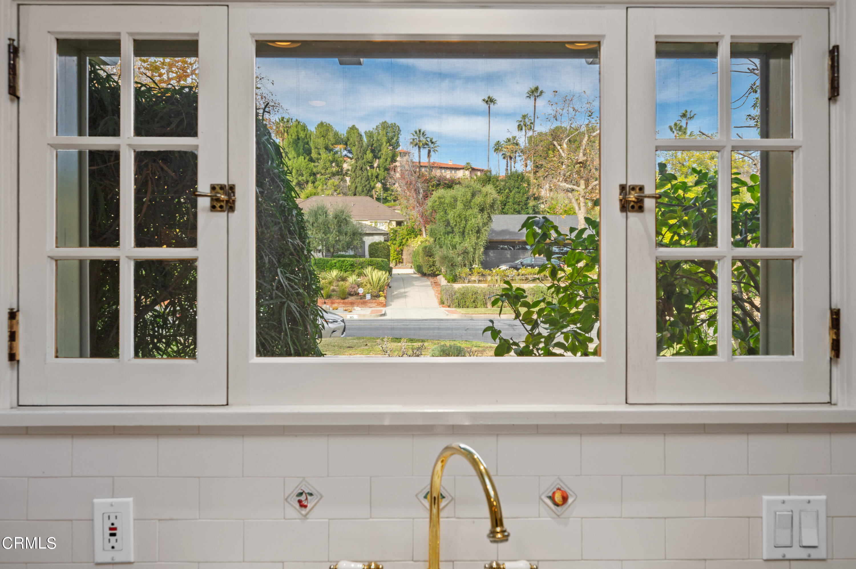 818 Old Mill Road Pasadena, CA 91108 - Photo 22 of 71 a view of a window in a kitchen