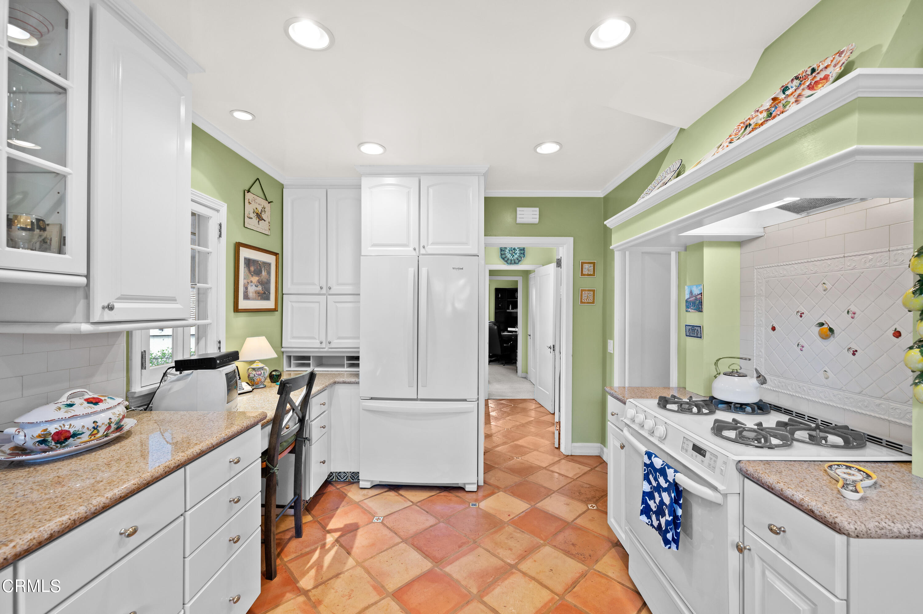 818 Old Mill Road Pasadena, CA 91108 - Photo 24 of 71 a kitchen with a sink and a stove top oven