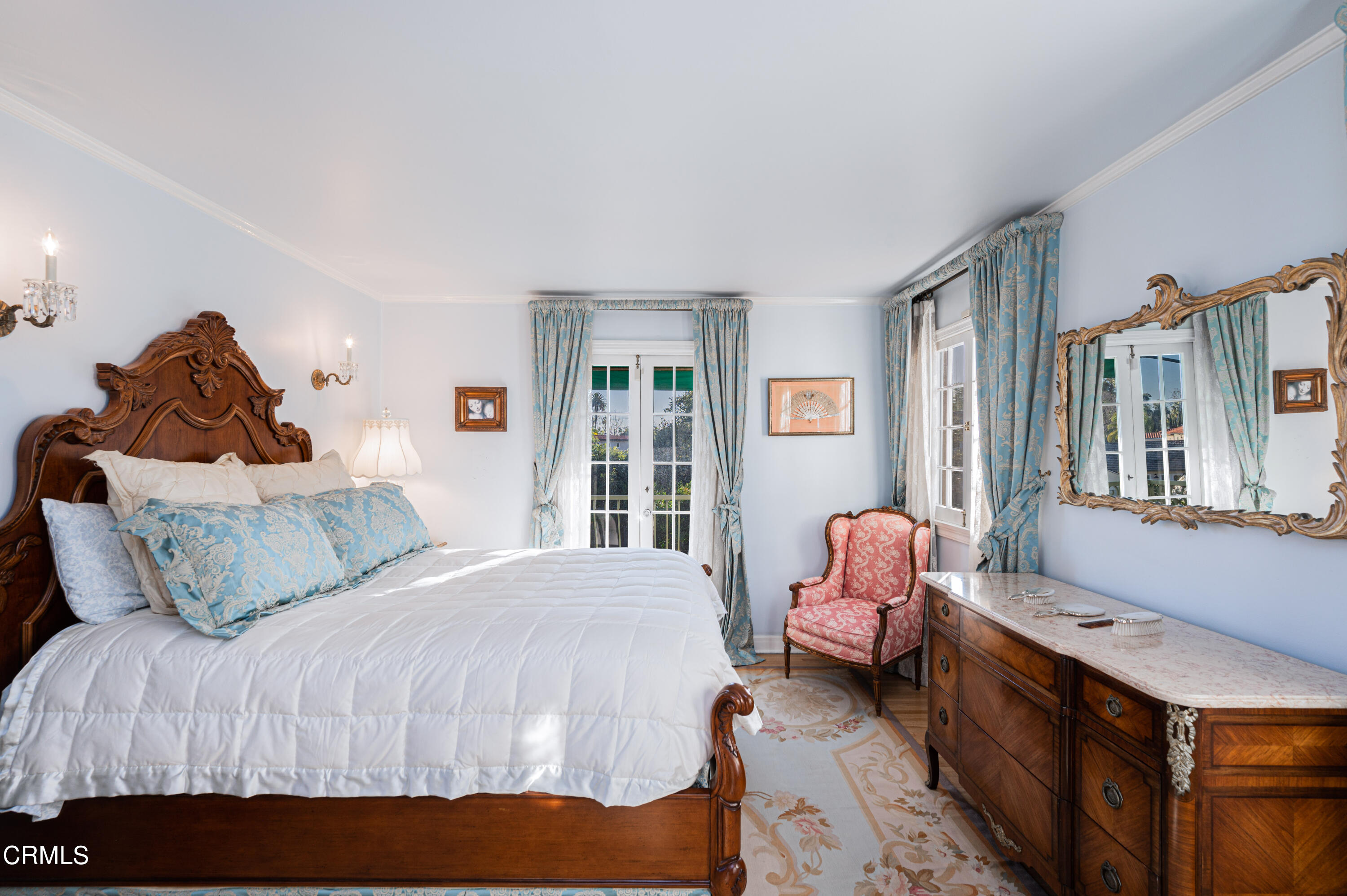 818 Old Mill Road Pasadena, CA 91108 - Photo 35 of 71 a bedroom with a bed and wooden floor