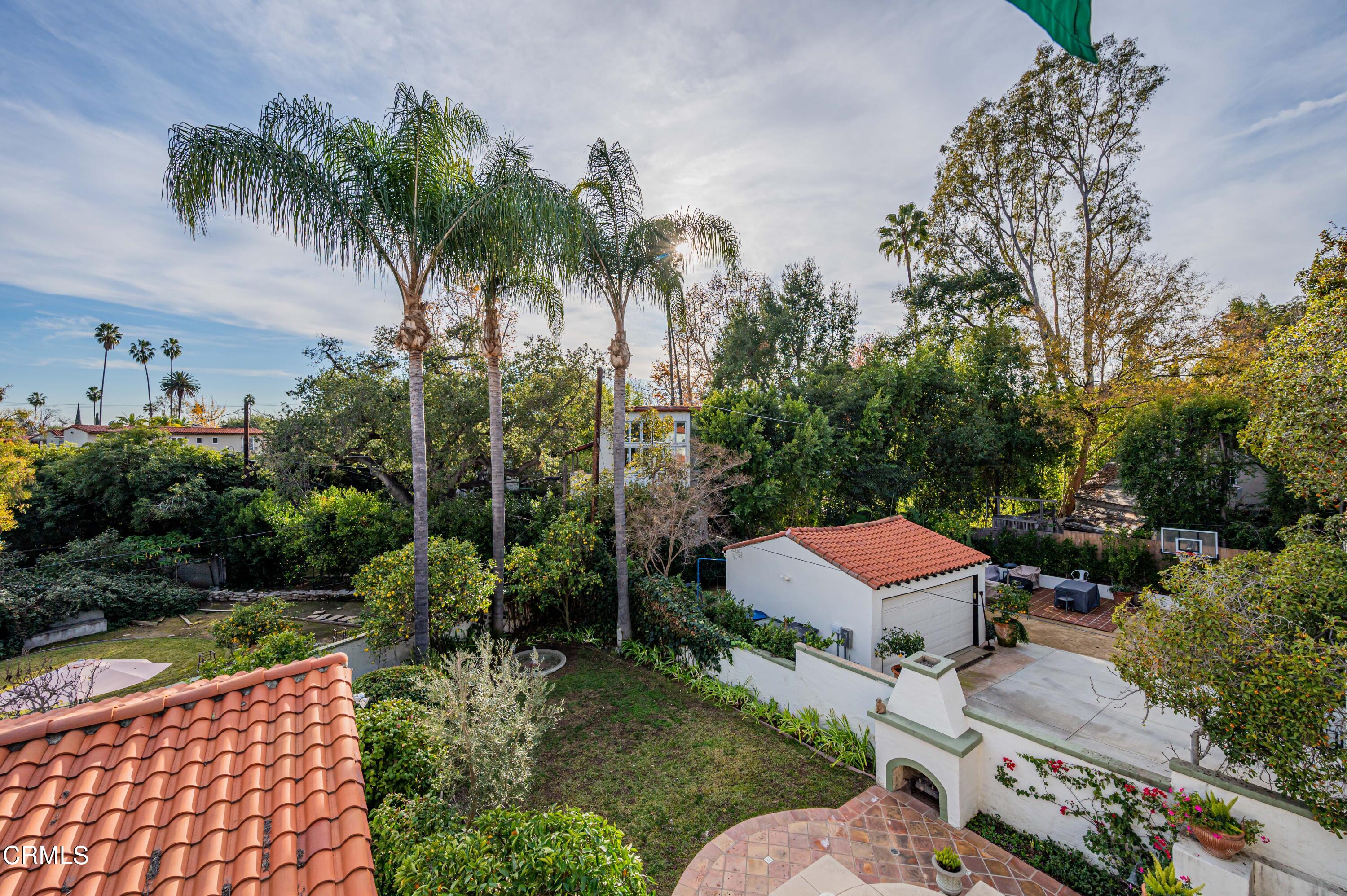 818 Old Mill Road Pasadena, CA 91108 - Photo 37 of 71 a view of a house with a yard and sitting area