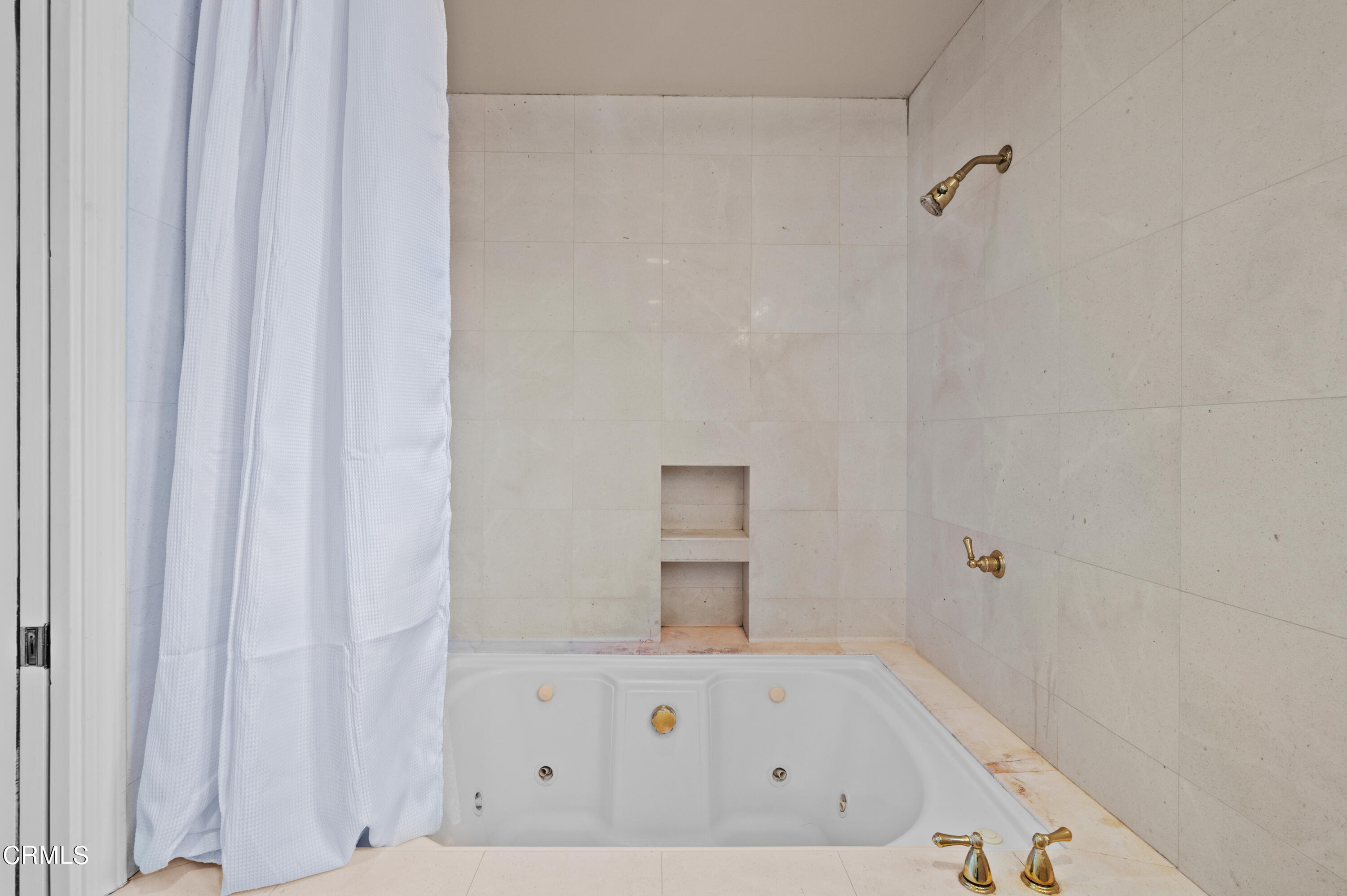 818 Old Mill Road Pasadena, CA 91108 - Photo 40 of 71 a bathroom with a bathtub and shower