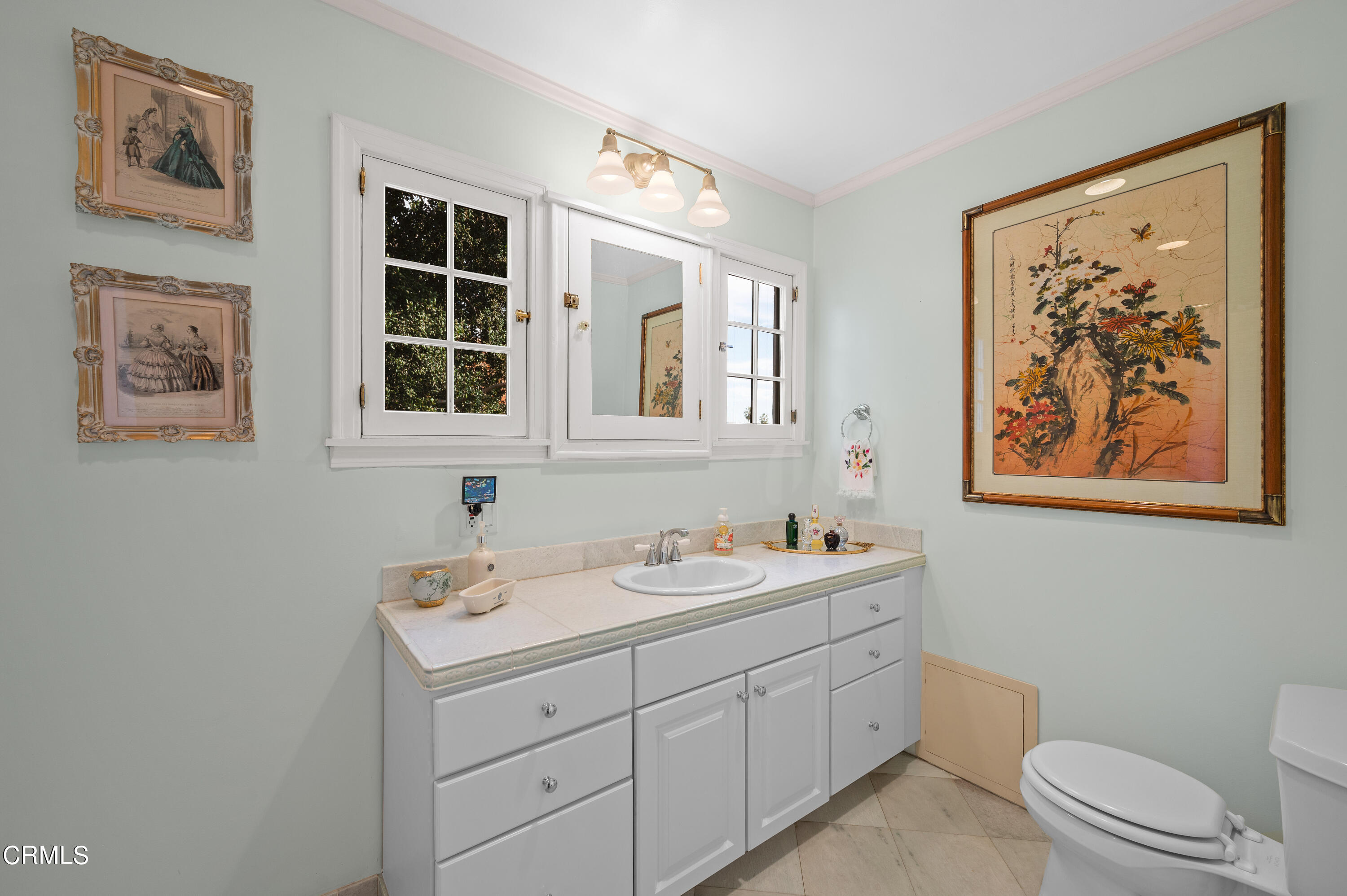 818 Old Mill Road Pasadena, CA 91108 - Photo 43 of 71 a bathroom with a toilet sink and mirror