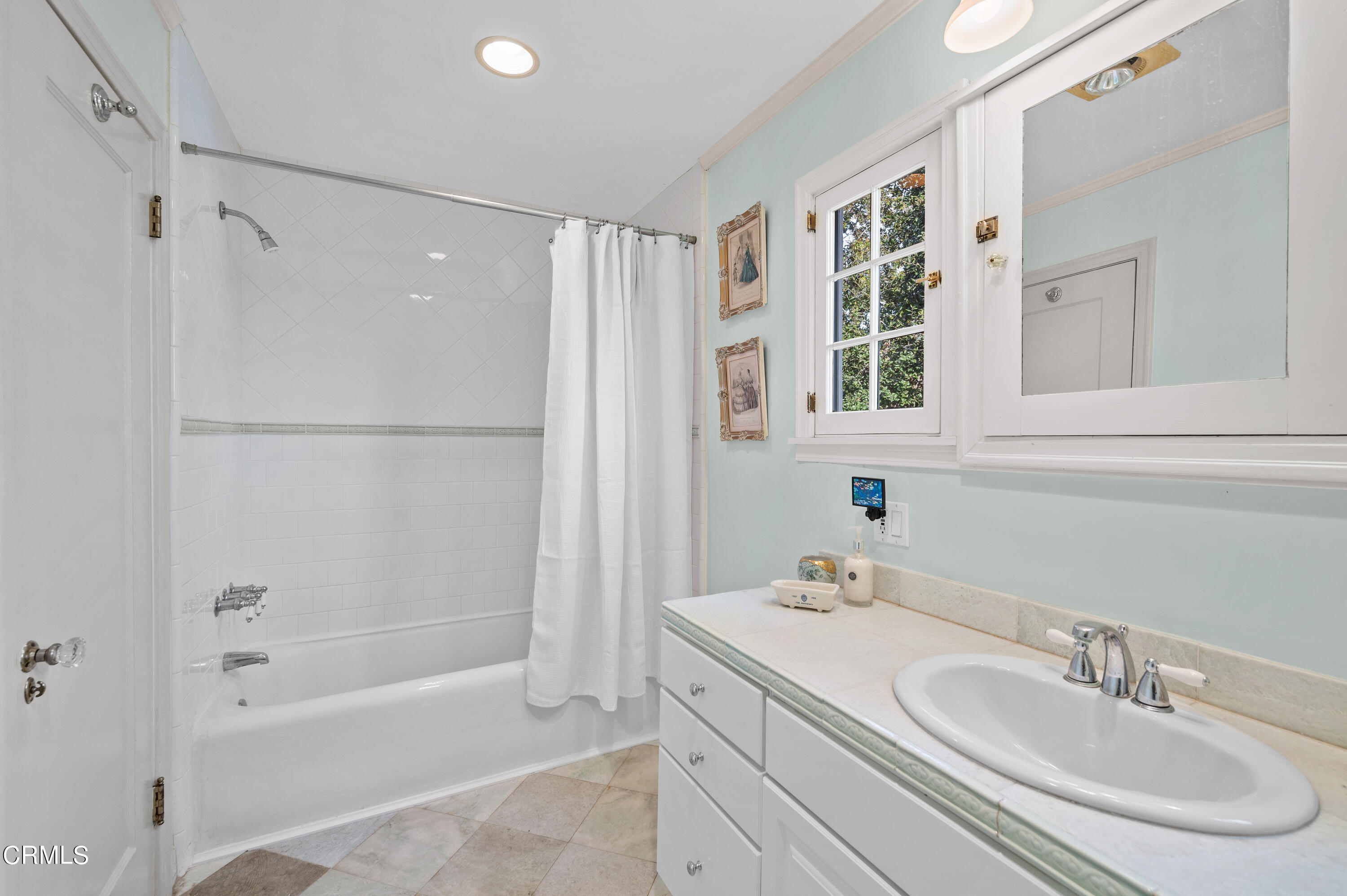 818 Old Mill Road Pasadena, CA 91108 - Photo 44 of 71 a bathroom with a granite countertop sink a mirror a shower and a bathtub