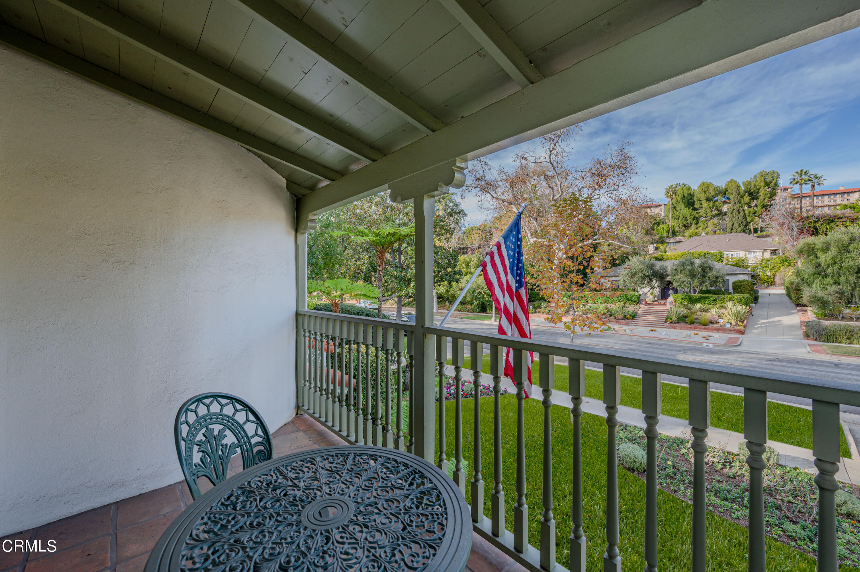 818 Old Mill Road Pasadena, CA 91108 - Photo 47 of 71 a view of a porch with a table and chairs