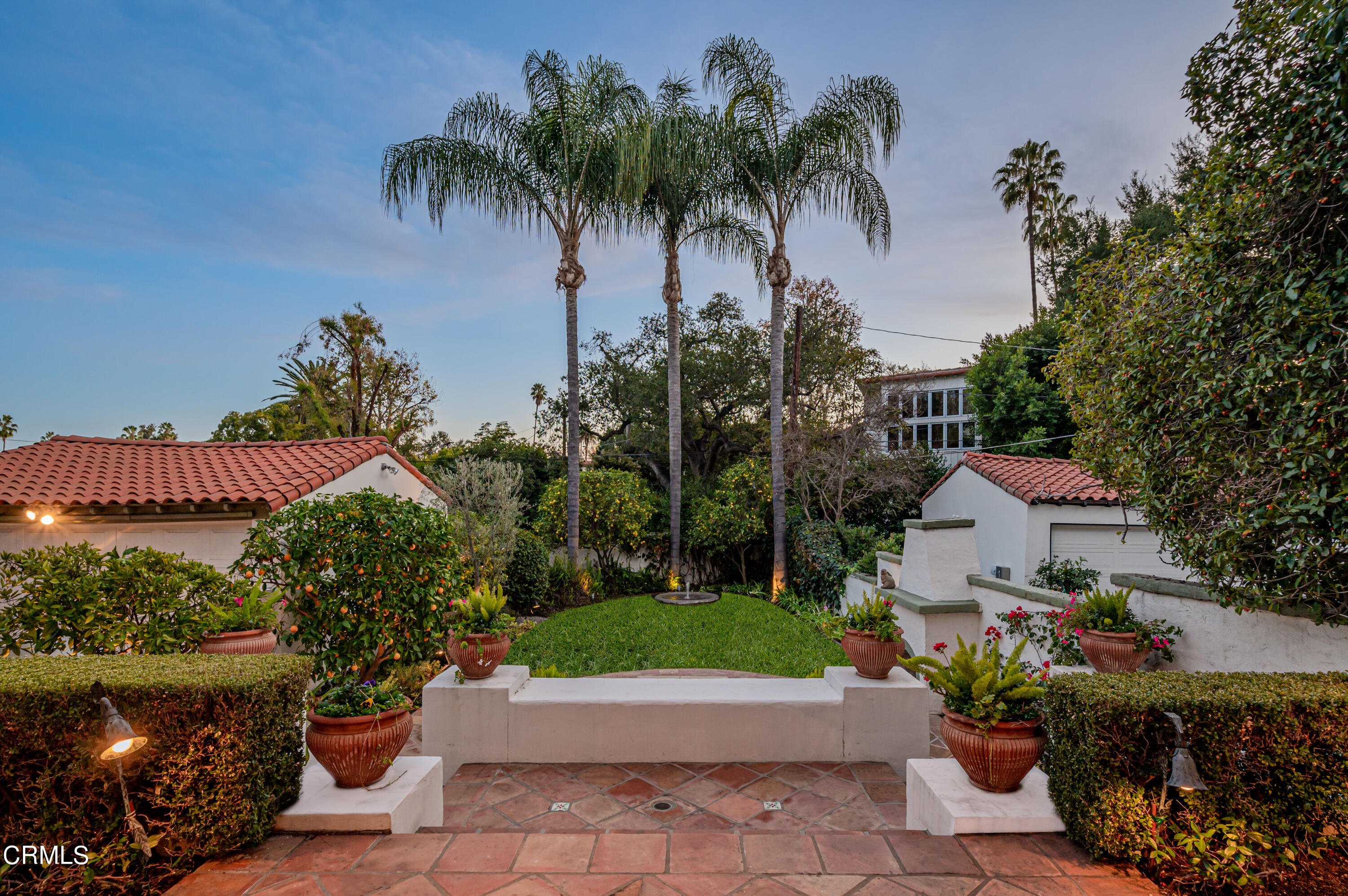 818 Old Mill Road Pasadena, CA 91108 - Photo 54 of 71 a front view of a house with a yard and a garden