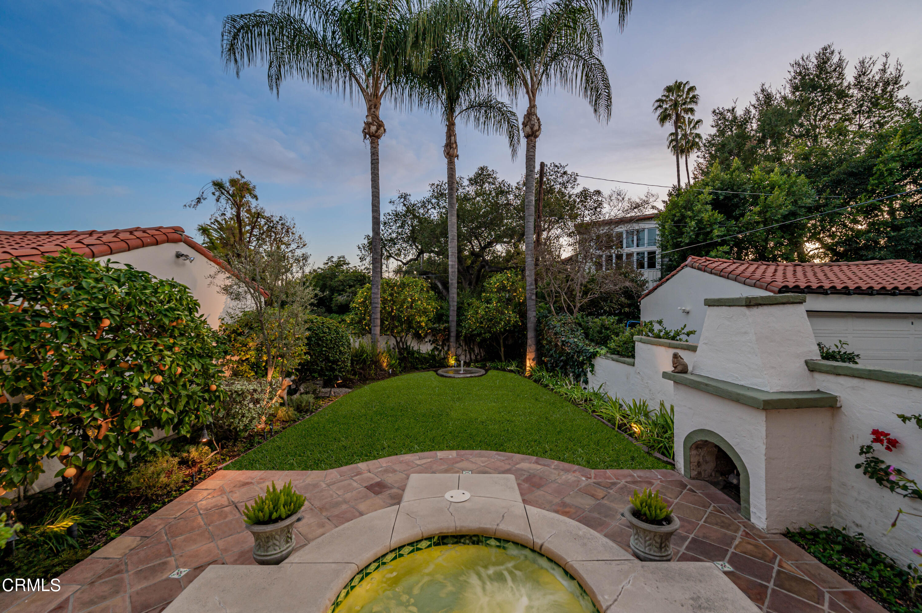 818 Old Mill Road Pasadena, CA 91108 - Photo 64 of 71 a view of a backyard with a garden and plants