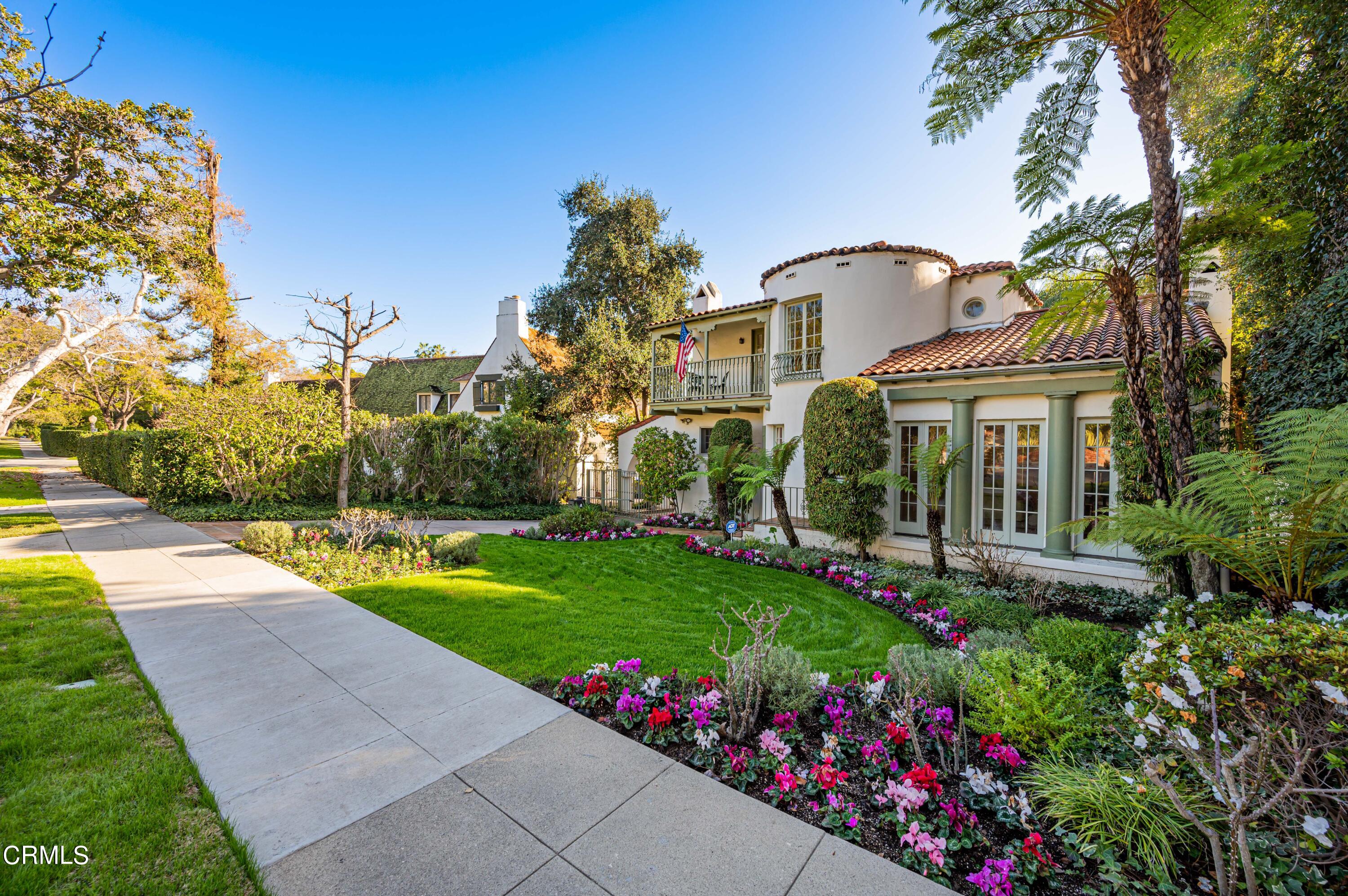 818 Old Mill Road Pasadena, CA 91108 - Photo 71 of 71 a front view of house and yard with beautiful flowers and green space
