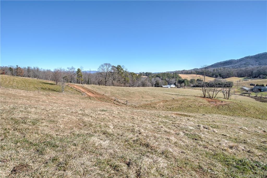 518 Old Newfound Road Leicester, NC 28748 - Photo 3 of 11 a view of an outdoor space with mountain view