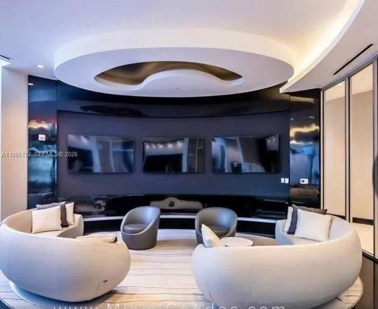 a kitchen with kitchen island a sink stainless steel appliances and a counter top