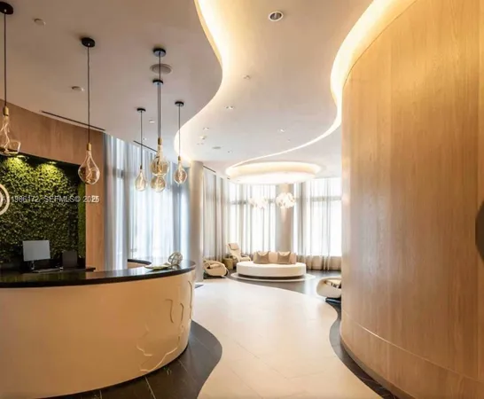 a view of a house with swimming pool and furniture