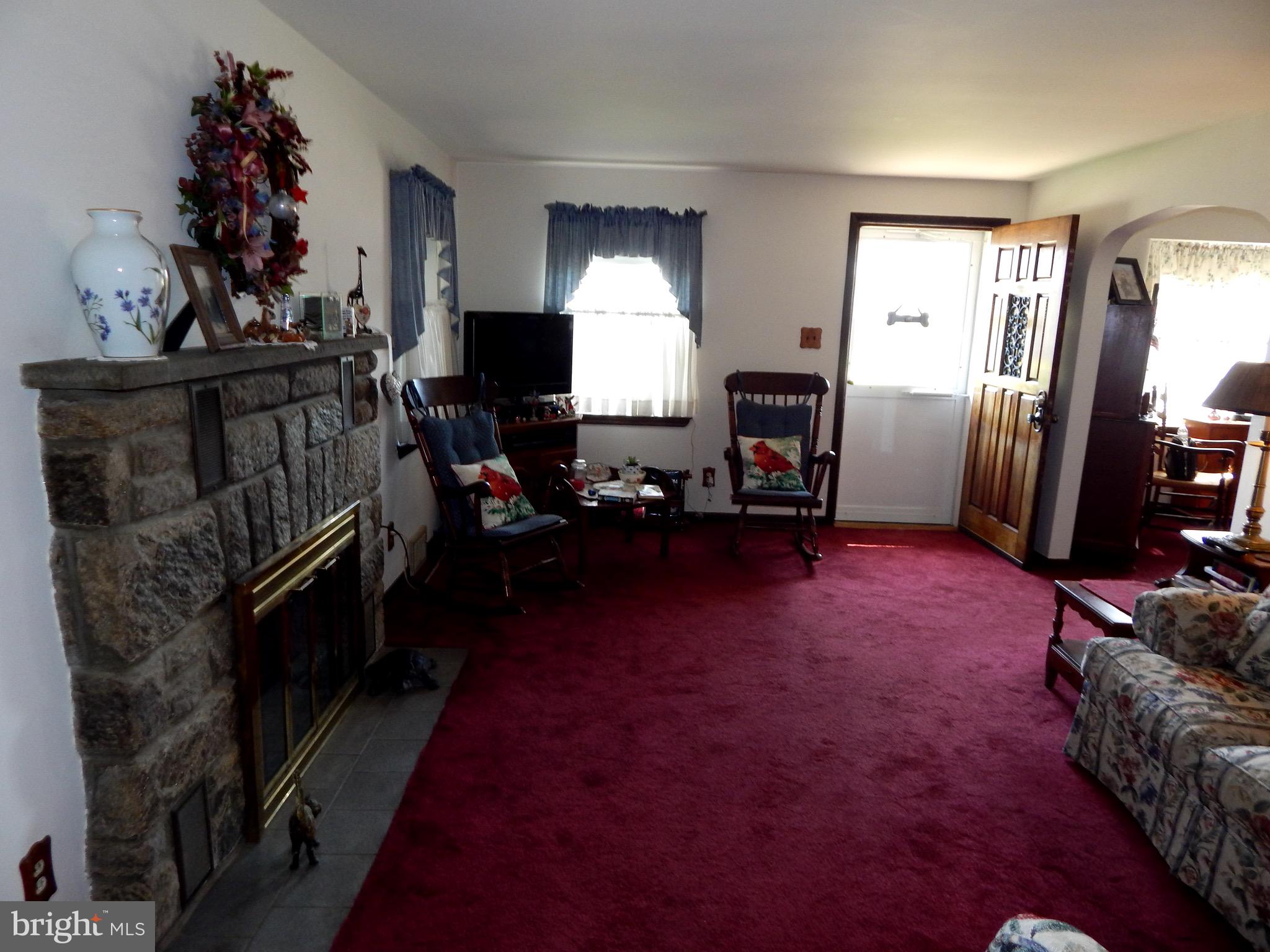 317 Nicholson Road Ridley Park, PA 19078 - Photo 4 of 36 Living room w/stone fireplace, wood window sills