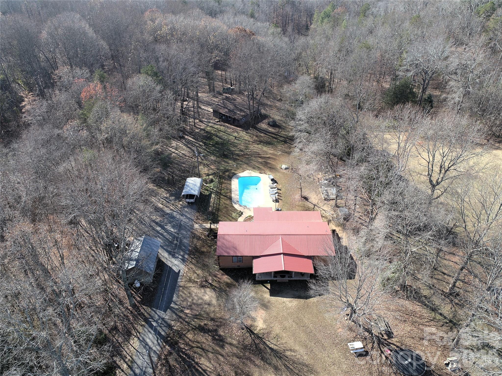 11443 Mooresville Road Davidson, NC 28036 - Photo 23 of 47 a view of a backyard with furniture