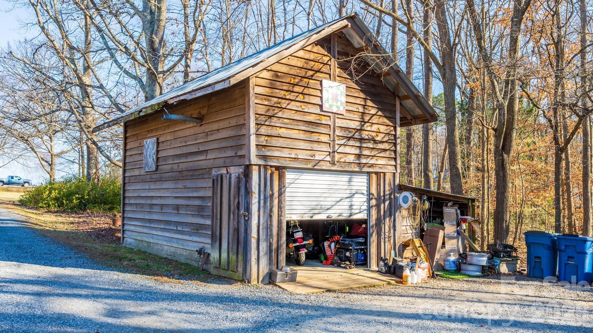 11443 Mooresville Road Davidson, NC 28036 - Photo 26 of 47 a view of a house with a patio