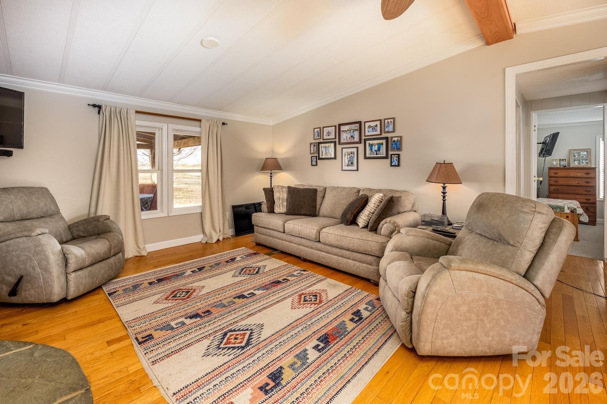 11443 Mooresville Road Davidson, NC 28036 - Photo 31 of 47 a living room with furniture and a couch