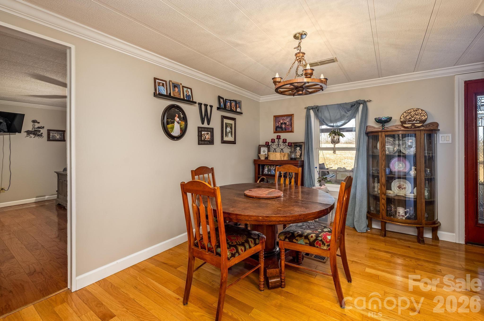 11443 Mooresville Road Davidson, NC 28036 - Photo 38 of 47 a view of a dining room with furniture