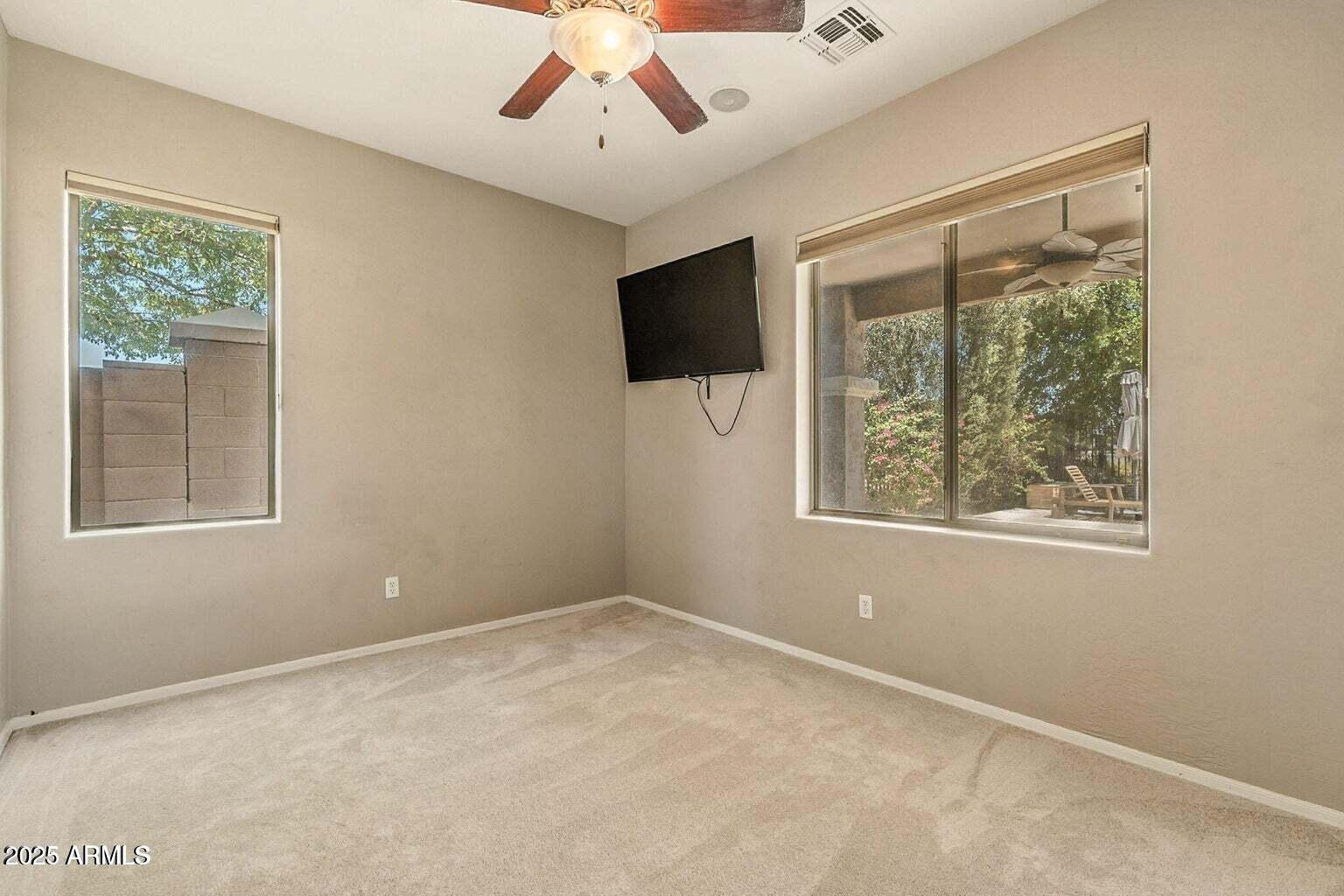 7169 South Dodane Court Gilbert, AZ 85298 - Photo 11 of 23 a view of an empty room with a window